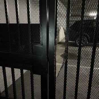 Lawrence Station Apartments - Broken gate in the garage. You can slip your arm in and pop the door right open. - Apartments Near Me - Sunnyvale, California