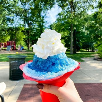 Tropical Moose Shaved Ice - a hand holding a red, white and blue ice cream cone - Shaved Ice Near Me - Webster Groves, Missouri Tropical Moose Shaved Ice - a hand holding a red, white and blue ice cream cone - Shaved Ice Near Me - Webster Groves, Missouri