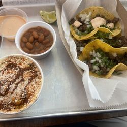 Nacho Libre Taqueria - Mexican corn, pinto beans and steak tacos.