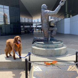 Snacks dawning Orange at astronaut Michael Anderson memorial statue in RiverFront Park