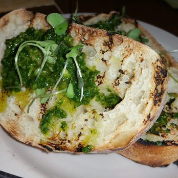 The Hideout Kitchen - Pesto toasted bread that comes with seafood stew - New American Near Me - Lafayette, California The Hideout Kitchen - Pesto toasted bread that comes with seafood stew - New American Near Me - Lafayette, California