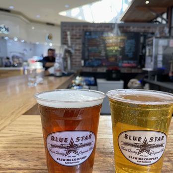 Blue Star Brewing - two glasses of beer on a bar - Beer Bar Near Me - San Antonio, Texas Blue Star Brewing - two glasses of beer on a bar - Beer Bar Near Me - San Antonio, Texas