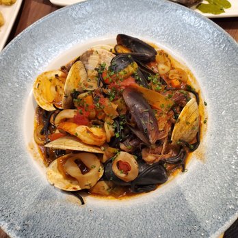 Dryft - Frutti Di Mare w/ squid -ink spaghetti, shrimp, clams, mussels, calamari, tomato - Seafood Near Me - Revere, Massachusetts Dryft - Frutti Di Mare w/ squid -ink spaghetti, shrimp, clams, mussels, calamari, tomato - Seafood Near Me - Revere, Massachusetts