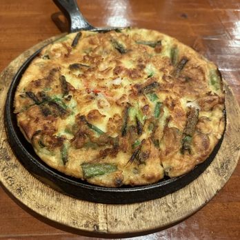 Seoul Tofu House - Seafood Pancake (small) - cut into 4 pieces - Korean Near Me - Duluth, Georgia Seoul Tofu House - Seafood Pancake (small) - cut into 4 pieces - Korean Near Me - Duluth, Georgia