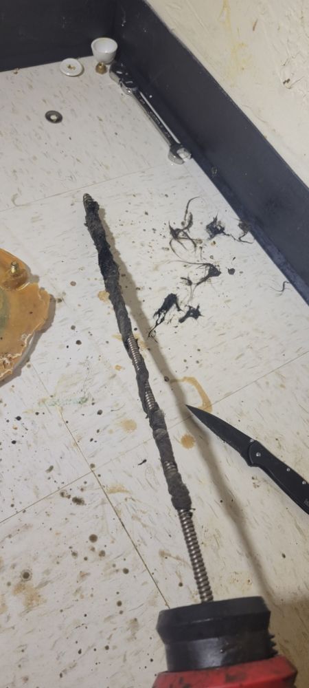 Slide of ED's Drain Cleaning