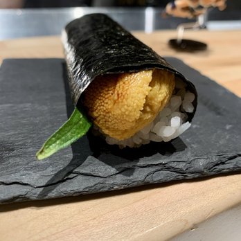 Handies Douzo - The uni handroll tastes as sexy as it looks. - Sushi Bars Near Me - Houston, Texas Handies Douzo - The uni handroll tastes as sexy as it looks. - Sushi Bars Near Me - Houston, Texas