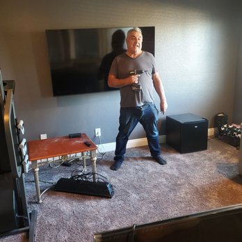 99 TV Install - John hanging wall - Home Theatre Installation Near Me - Upland, California