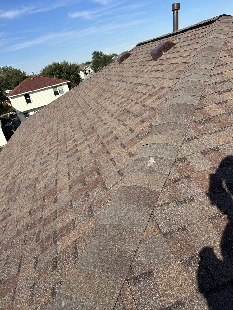 Slide of Mancia's Roofing Services