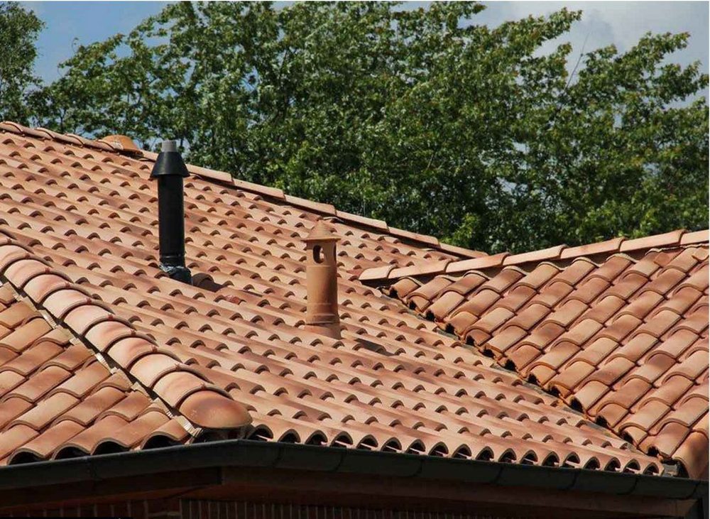 Slide of T Rock Roofing & Construction