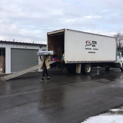Total Moving - "Muscles McGee" unloading into storage :)
(Thanks Carlos)