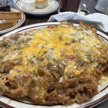 Vic's Daily Cafe - Vaqueros. Lots of stuff under. Eggs, has browns and refried beans - American Near Me - Albuquerque, New Mexico Vic's Daily Cafe - Vaqueros. Lots of stuff under. Eggs, has browns and refried beans - American Near Me - Albuquerque, New Mexico