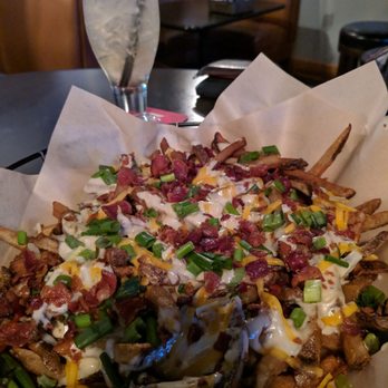 The Angry Goat Pub - Smothered fries - Pubs Near Me - Rochester, New York The Angry Goat Pub - Smothered fries - Pubs Near Me - Rochester, New York