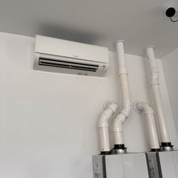 Cool Atmosphere Heating and Air - Internal wall mounted mini split in garage