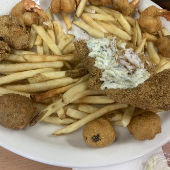 Shrimp N Stuff Downtown - Seafood Sample: hush puppies, French Fries, Fried Shrimp, fried oysters, Fried Catfish - Seafood Near Me - Galveston, Texas