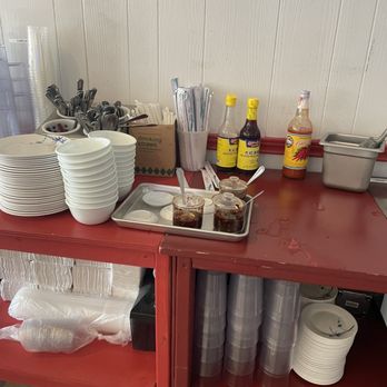 Fat Dragon - the table towards the back of the restaurant where the customer helps themselves to ice, cups, plates and sauces - Asian Fusion Near Me - Austin, Texas Fat Dragon - the table towards the back of the restaurant where the customer helps themselves to ice, cups, plates and sauces - Asian Fusion Near Me - Austin, Texas