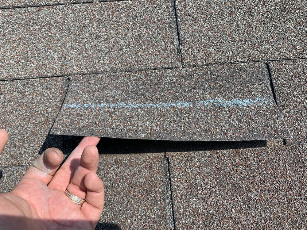 Slide of Top Notch Roofing