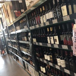 shelves of wine in a store
