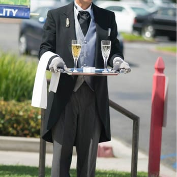 Classic Limos - Our driver meeting us out front after church with congratulatory champagne! - Limos Near Me - Newport Beach, California Classic Limos - Our driver meeting us out front after church with congratulatory champagne! - Limos Near Me - Newport Beach, California