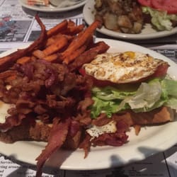 Patrick's Bar & Grill - Food is awesome and great prices.  Their sweet potato fries are the bomb.  I had a BLT w a fried egg ,Yikes so big!!!
