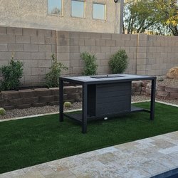 Landscaping Professional Service - Finished, a very nice backyard with desert plants, rocks, planter, Turf and Golf.