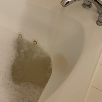 Ryde Hotel - Rusty water going into the dirty tub. - Hotels Near Me - Walnut Grove, California Ryde Hotel - Rusty water going into the dirty tub. - Hotels Near Me - Walnut Grove, California