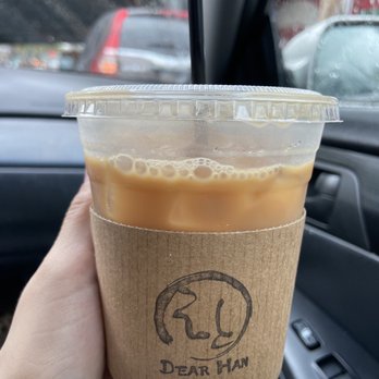 Dear Han Cafe - Iced coffee w reg milk + caramel syrup - Coffee & Tea Near Me - Woodside, New York