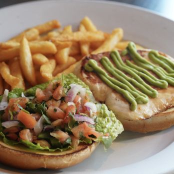 Lula B's Breakfast Brunch and Bar - Chicken Sandy-Grilled chicken breast topped with lettuce, pico de gallo, and homemade guacamole served on a broiche bun - Breakfast & Brunch Near Me - Omaha, Nebraska Lula B's Breakfast Brunch and Bar - Chicken Sandy-Grilled chicken breast topped with lettuce, pico de gallo, and homemade guacamole served on a broiche bun - Breakfast & Brunch Near Me - Omaha, Nebraska