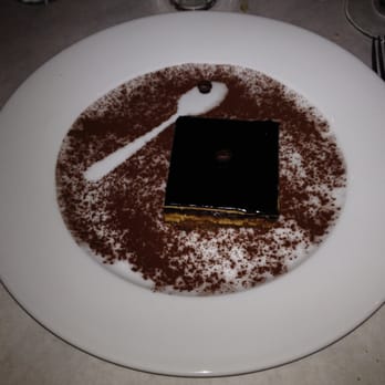 Le Bistro - opera - 7layers of jocund biscuit, coffee butter cream, and chocolate ganache - French Near Me - Houston, Texas