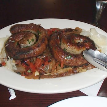 Sicilian Oven - Cervelatta on bed of sauteed onion and pepper - Italian Near Me - Lighthouse Point, Florida Sicilian Oven - Cervelatta on bed of sauteed onion and pepper - Italian Near Me - Lighthouse Point, Florida