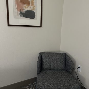 Embassy Suites by Hilton Phoenix Tempe - Chair in corner by beds - Hotels Near Me - Tempe, Arizona Embassy Suites by Hilton Phoenix Tempe - Chair in corner by beds - Hotels Near Me - Tempe, Arizona