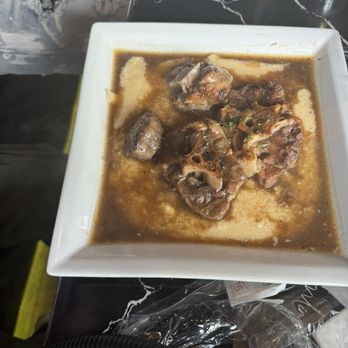Unforgettable Kitchen and Cocktails - Oxtail & Grits - Lounges Near Me - Houston, Texas