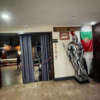 Iberia Bar & Grill - The entrance with our knight - Portuguese Near Me - Greenacres, Florida