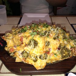 Rosalinda's - These nachos had jalapeños, cheese, pico de gallo, cilantro, onions, and mixed meat including chicken & carnitas.