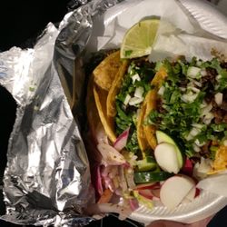 Los Mejores Tacos - Two steak tacos and one chorizo taco