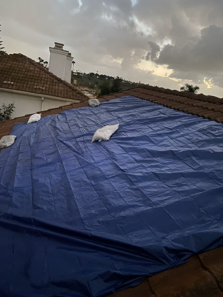 Slide of Baynes Roofing