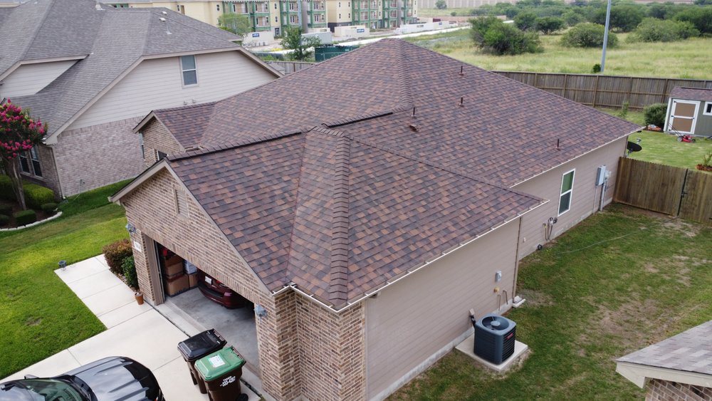 Slide of Magnum Roofing & Restoration