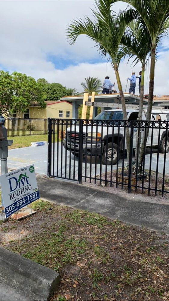 Slide of DM Roofing Company