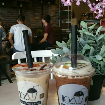 1102 Bubble Tea & Bites - Hazelnut with black tea base and coffee flan jelly (left) , Mango Black Tea with tapioca (right) - comes with fresh mango! - Desserts Near Me - Arlington, Texas