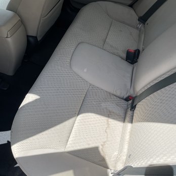 Complete Detailers - Before photo of stains in the back seat - Auto Detailing Near Me - Farmingdale , New York Complete Detailers - Before photo of stains in the back seat - Auto Detailing Near Me - Farmingdale , New York