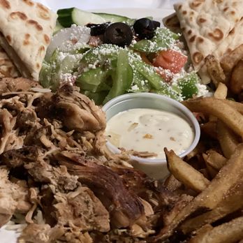 OPA Grill & Tavern - Chicken Platter Chicken over rice, Greek salad, fries and pita. Garlic aioli - Greek Near Me - Delaware, Ohio OPA Grill & Tavern - Chicken Platter Chicken over rice, Greek salad, fries and pita. Garlic aioli - Greek Near Me - Delaware, Ohio