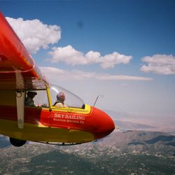 Walnut Hills Family Dentistry - Flying a Sailplane at Warner springs area over a lake.