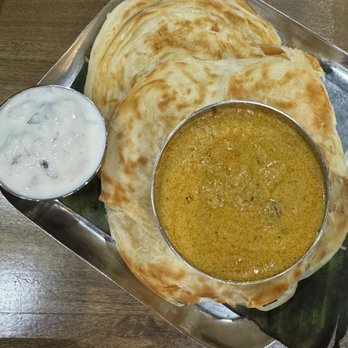 Anjappar Chettinad Indian Restaurant - Malabar Parotta (2pcs) (B) - Indian Near Me - Cary, North Carolina Anjappar Chettinad Indian Restaurant - Malabar Parotta (2pcs) (B) - Indian Near Me - Cary, North Carolina