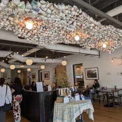 The Café and Shop at Thistle Farms - The amazing teacup art installation as you enter the cafe