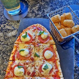 Margherita pizza and tots