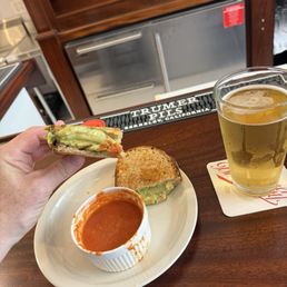 Grilled avo and cheese with a lager