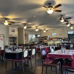 Kula Bistro - Restaurant - cute! That case at the end is full of delightfully delicious deserts anyone could want!