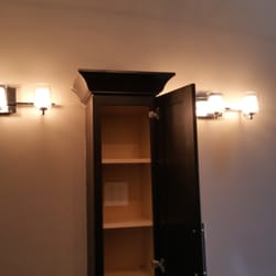 Roy Electric - Vanity lighting including in cabinet outlets