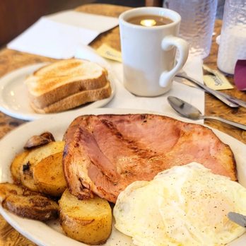 Sunshine Cafe - Ham steak substitute fried potatoes for hash browns white toast eggs over medium cawfee. Get your yummers on! - American Near Me - Seymour, Indiana Sunshine Cafe - Ham steak substitute fried potatoes for hash browns white toast eggs over medium cawfee. Get your yummers on! - American Near Me - Seymour, Indiana