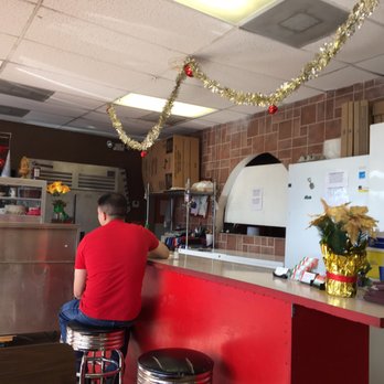 Antojitos Mexicanos - a man sitting at a counter - Mexican Near Me - Fort Lauderdale, Florida Antojitos Mexicanos - a man sitting at a counter - Mexican Near Me - Fort Lauderdale, Florida