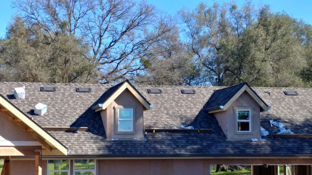 Slide of Harlan Quality Roofing